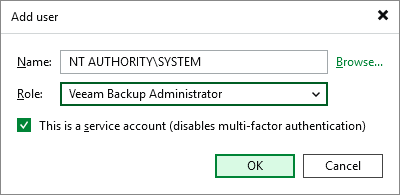 An "Add user" dialog box is open. The "Name" field is set to "NT AUTHORITY\SYSTEM" and the "Role" dropdown is set to "Veeam Backup Administrator." A checkbox is selected for "This is a service account (disables multi-factor authentication)." There are "OK" and "Cancel" buttons at the bottom.