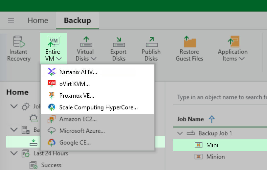 The Veeam Backup ribbon menu is open with the "Entire VM" restore option selected. A dropdown lists available destinations: "oVirt KVM," "Proxmox VE," and "Scale Computing HyperCore," with "Scale Computing HyperCore" highlighted. A tooltip appears, describing "Entire VM Restore" as "Restores the entire VM to Scale Computing HyperCore." Other restore and export options, like "Instant Recovery," "Virtual Disks," "Export Disks," "Publish Disks," and "VM Files," are visible in the ribbon.